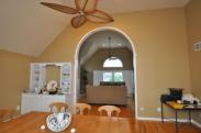 A view from the dining room table of the new arch and trim work by Drumm Design Remodel