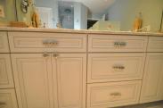 Elegant drawer hardware on this vanity really gave this room a nice finishing touch
