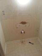 Time for the old bathroom to go, as Drumm Design Remodel performs a clean tear out