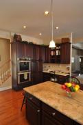 A nice view of the new granite countertops on the center island in this dream kitchen by Drumm Design Remodel