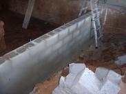 A new block wall to provide future support for this home