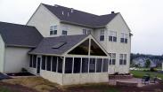 Another view of the porch and patio designed by Drumm Design Remodel