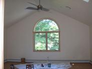 Vaulted ceilings and an arched window provide lots of light