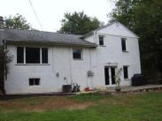 The back of the home before