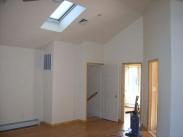 Vaulted ceilings and skylight for more available light