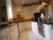 A roomy and elegant kitchen by Drumm Design Remodel