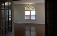 A view of the arched window in the family room