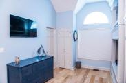 Drumm Design Remodel added extra closet space to this room for additional storage