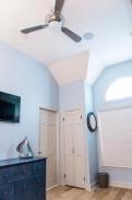 Drumm Design Remodel fixed the ceilings in this room and added a great ceiling fan that matches the decor of this terrific kids room
