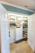 A great look at a way more organized closet that reduces clutter thanks to Drumm Design Remodel