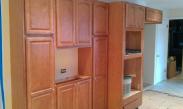 Kitchen cabinets ready for appliances soon.
