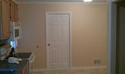 A door to minimize noise from the laundry room
